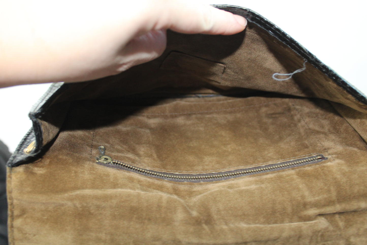 Zwarte clutch met snakeskin look