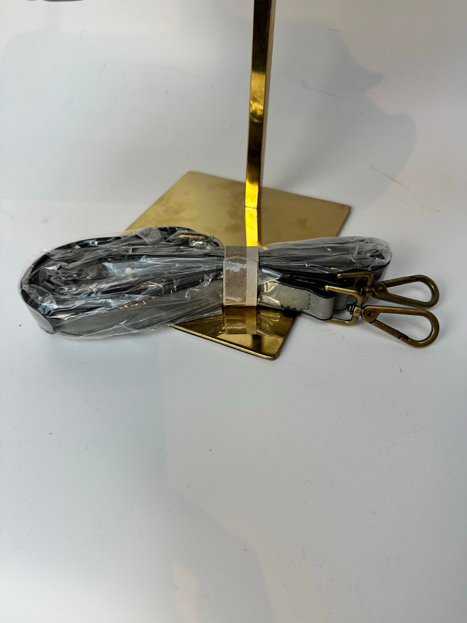 Zilver/witte schoudertas met lange strap