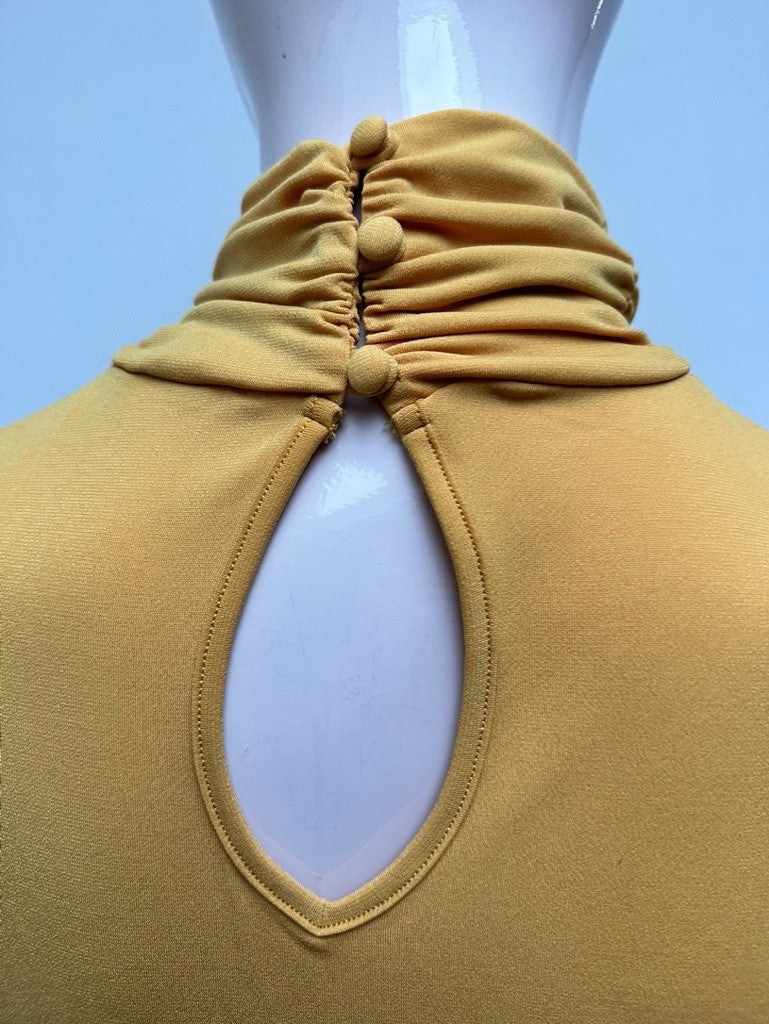 Taifun mouwloze col maat 40 geel