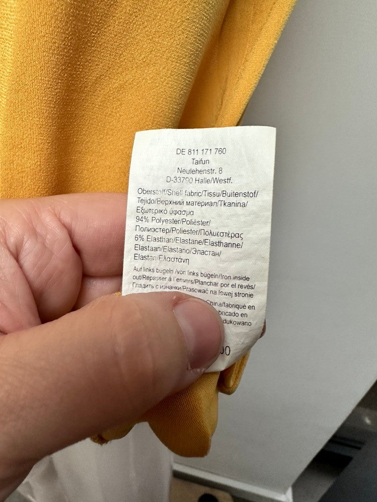 Taifun mouwloze col maat 40 geel