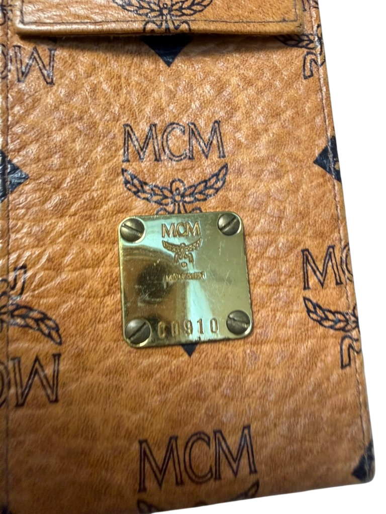 MCM Pennenmapje Bruin met zwart bedrukt logo patroon