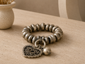 Armband met hartvormige bedel maat One size Zilver