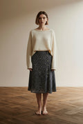 Full body view of the model wearing Grace & Mila rok maat M