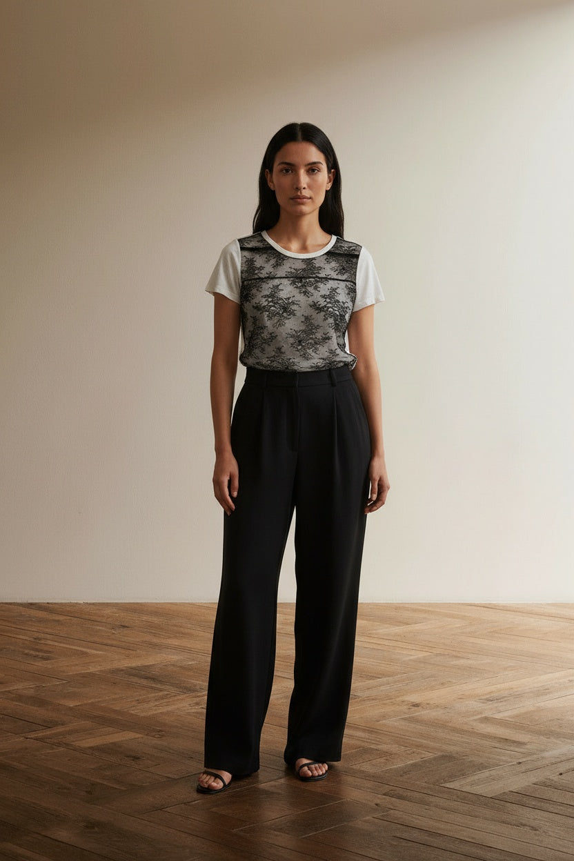 Full body view of the model wearing Sandro Paris Top maat M Off-white and Black
