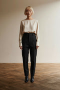 Full body view of the model wearing ISABEL MARANT Broek maat 38 Zwart