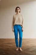 Full body view of the model wearing Marc Cain blauwe chino maat 4
