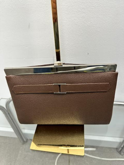 Bruine vintage avondtas met gouden accenten