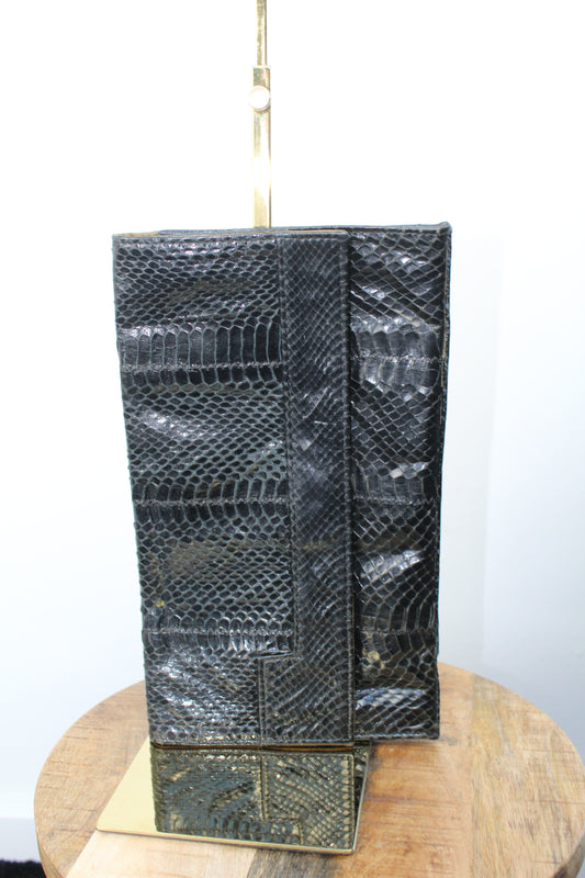 Zwarte clutch met snakeskin look