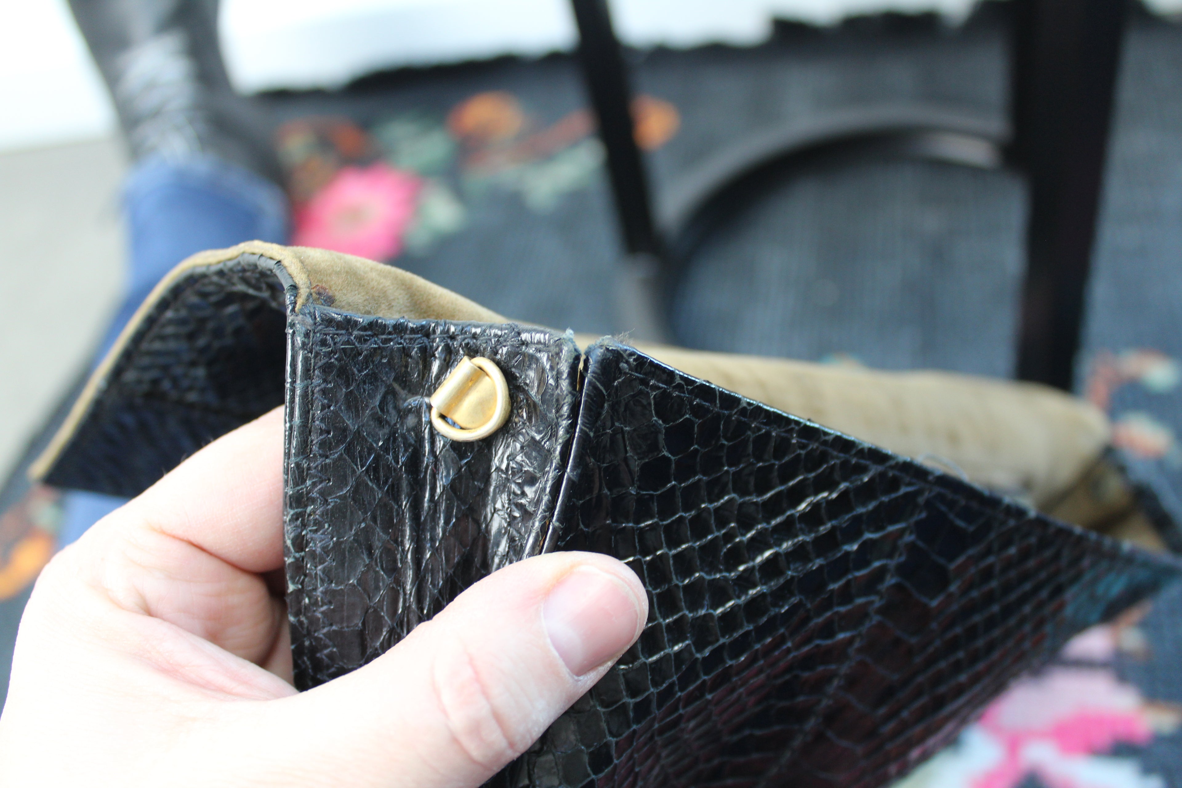 Vintage zwarte clutch met slangenprint