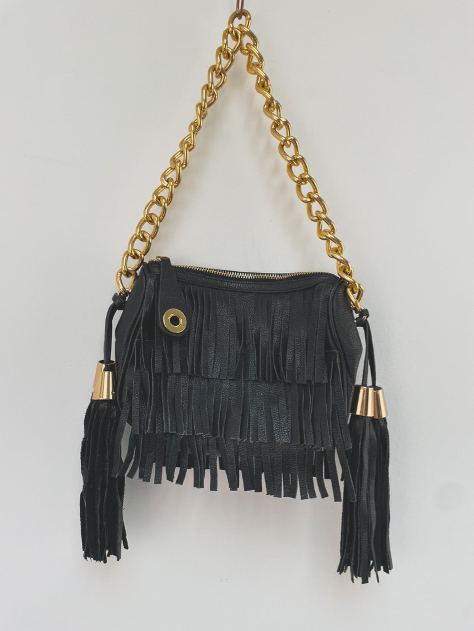 Zara clutch met franjes, tassles en gouden details