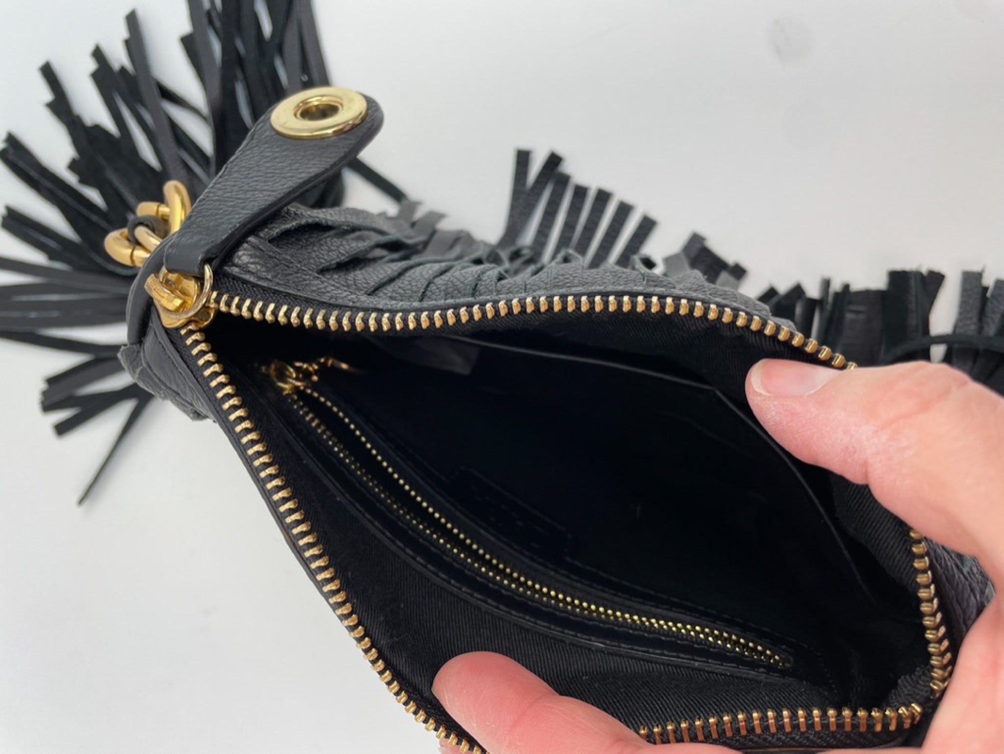 Zara clutch met franjes, tassles en gouden details