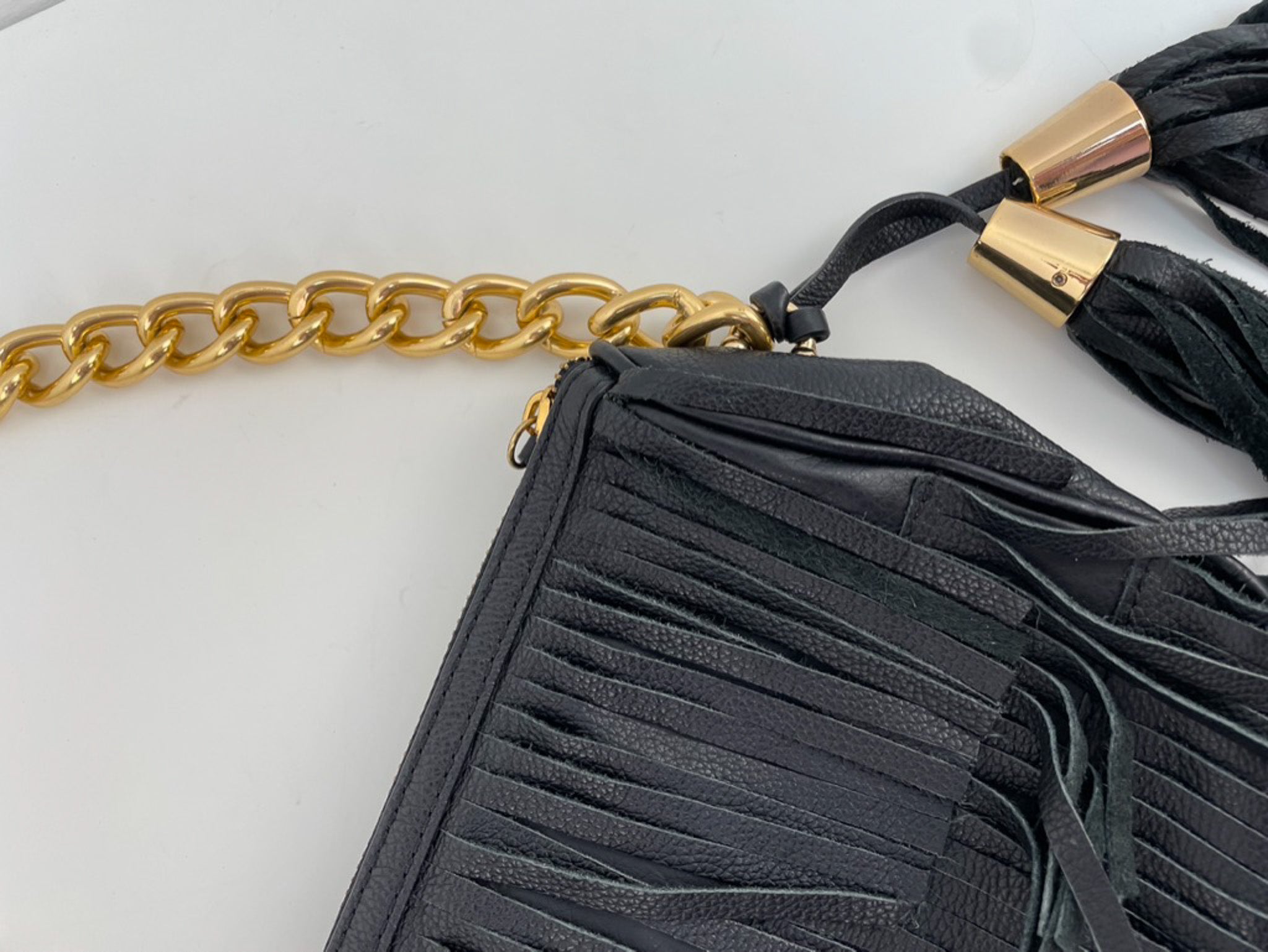 Zara clutch met franjes, tassles en gouden details