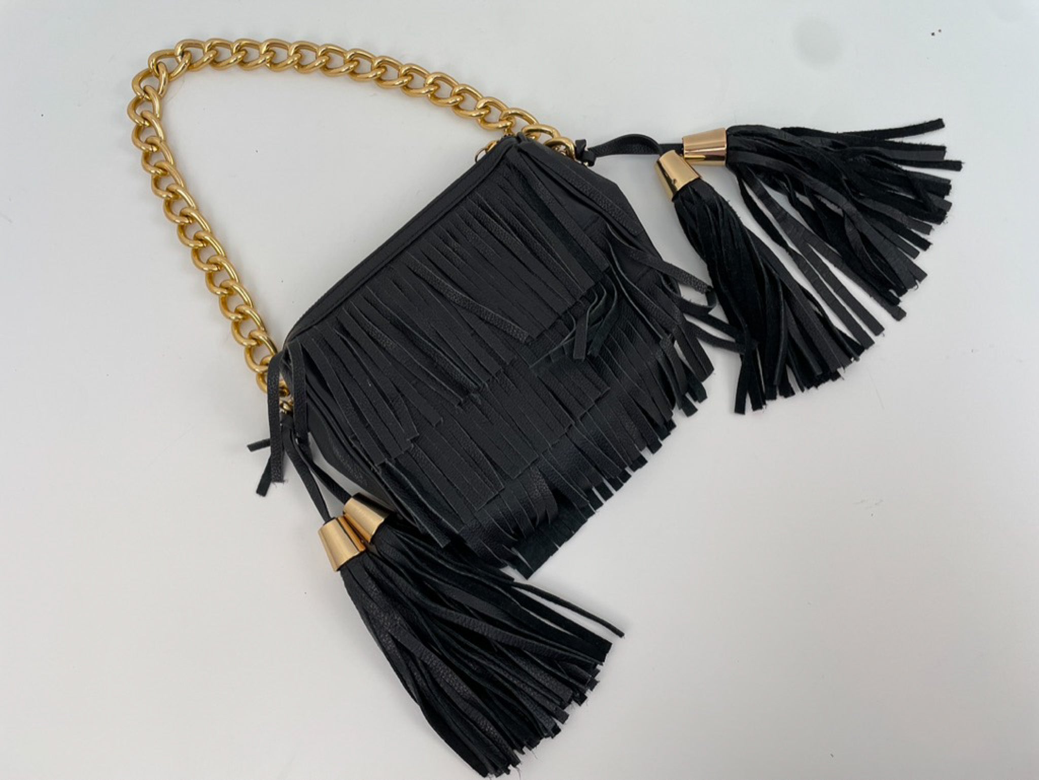 Zara clutch met franjes, tassles en gouden details